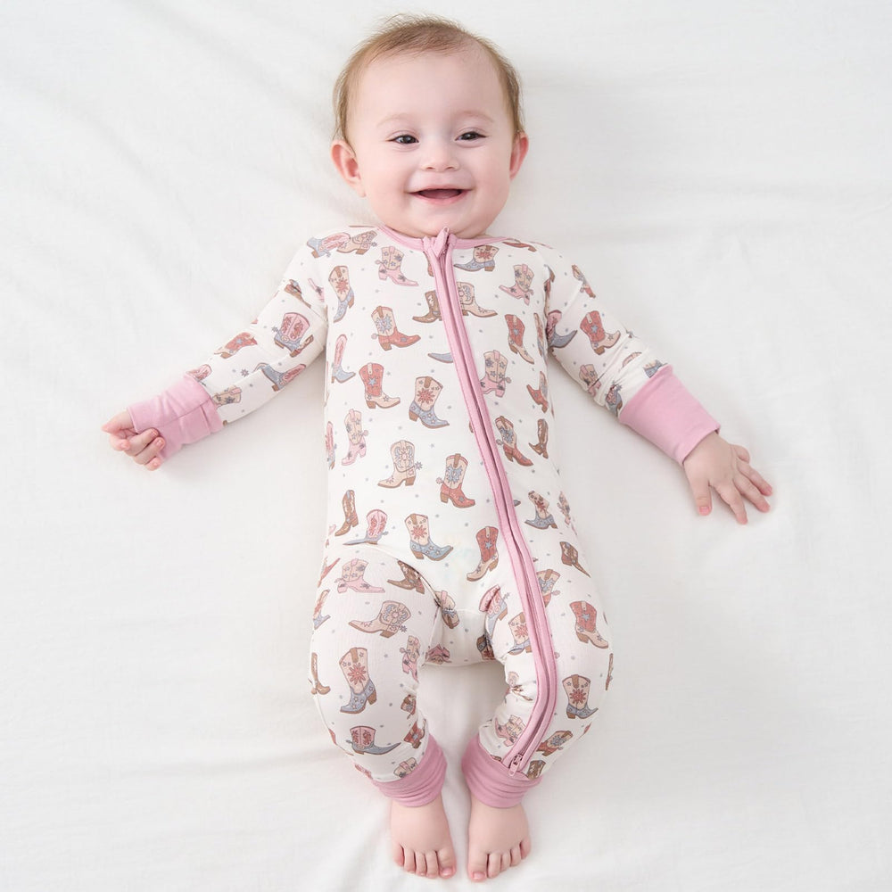 Pureborn sleeper 2-way zipper in action facilitates quick night diaper changes.