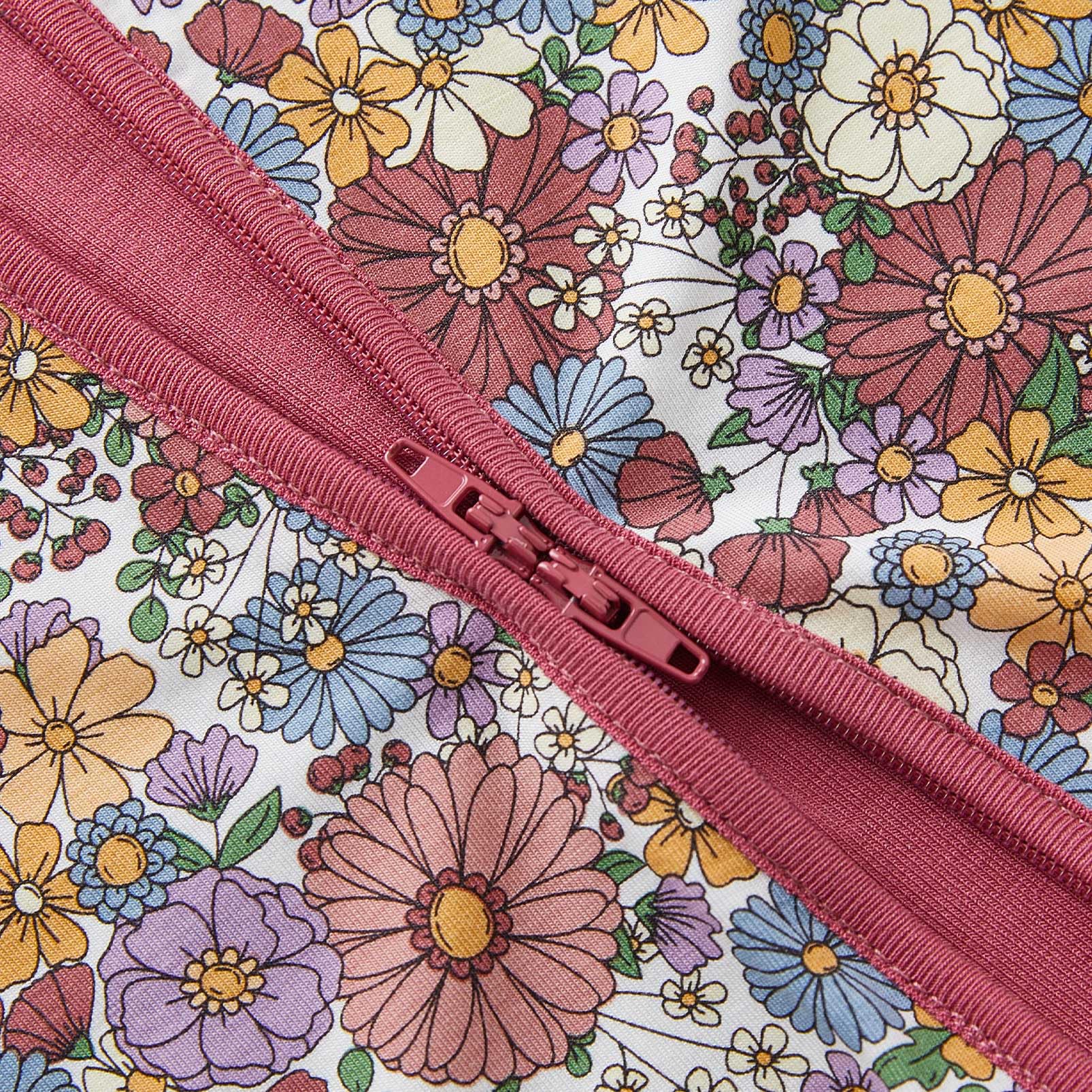 Pureborn 2-way zipper design supports quick diaper changes.