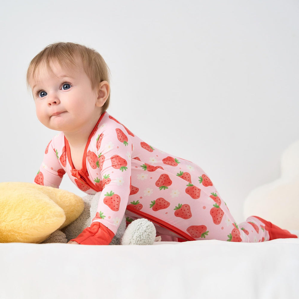 Pureborn sleeper with reversible mittens to prevent scratching and soothe delicate skin.