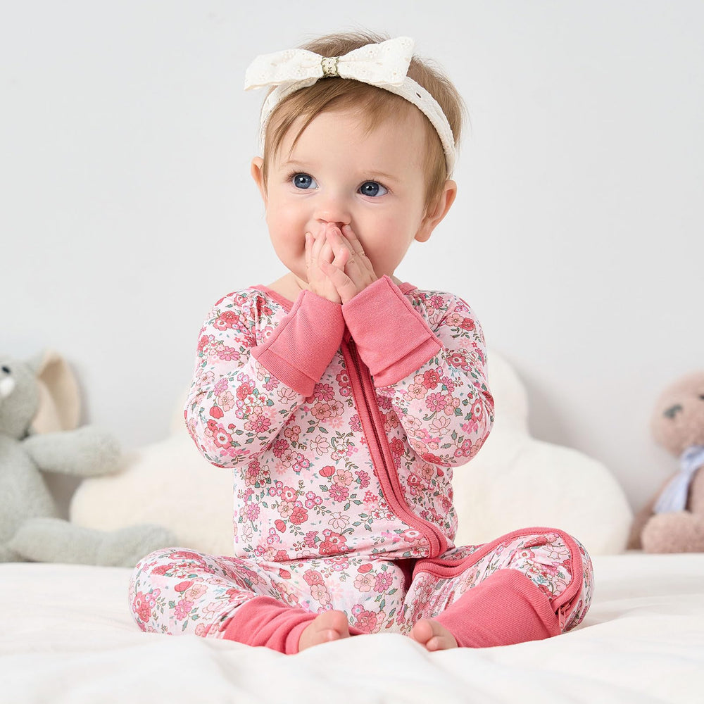 Reversible mittens protect tiny hands while sleeping.