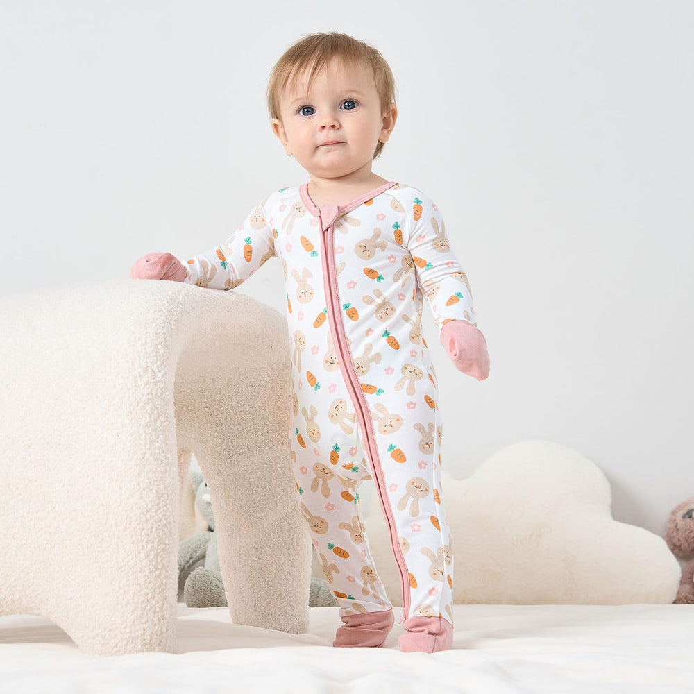Pureborn sleeper features reversible mittens to prevent scratching during naps.