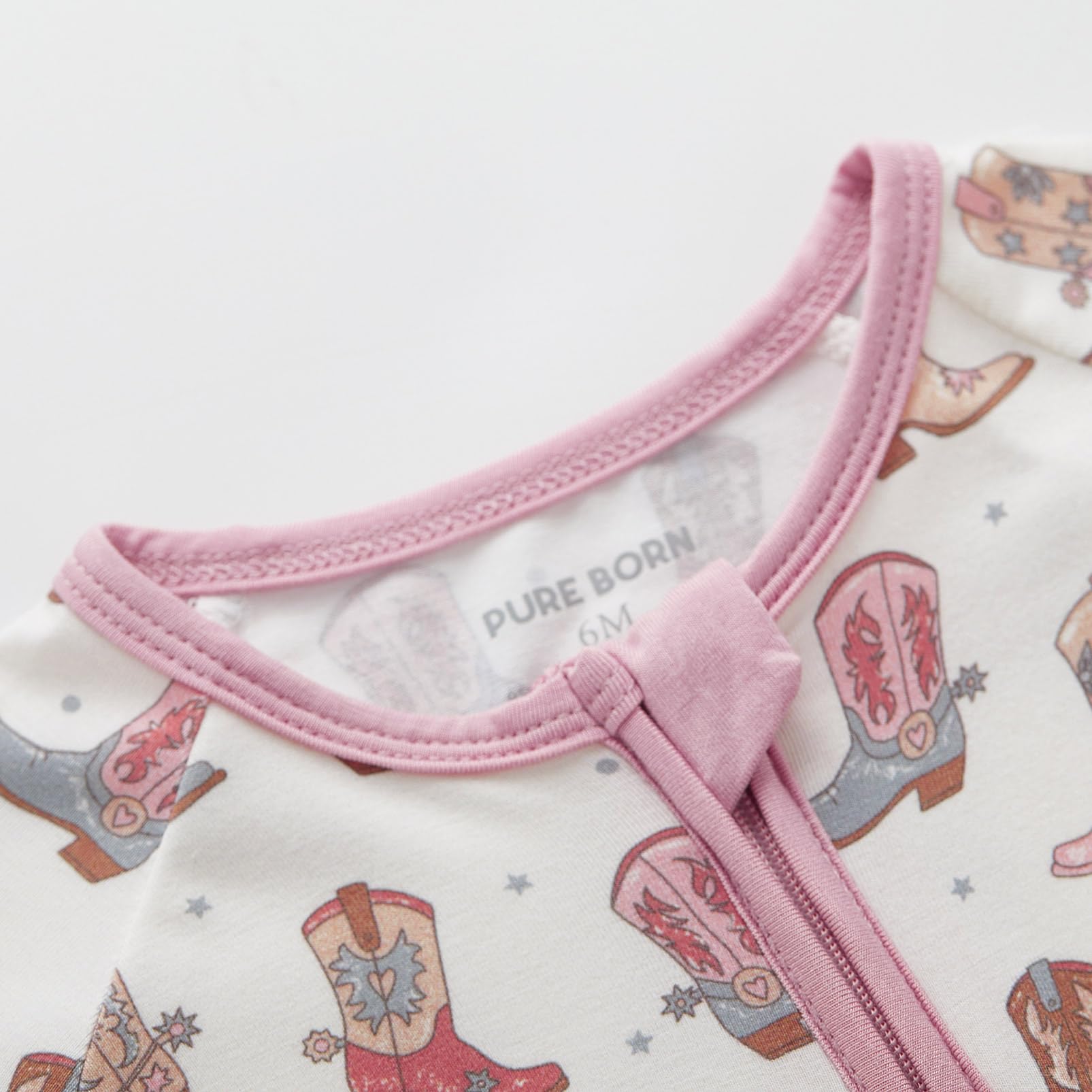 Pureborn sleeper tagless design reduces irritation for peaceful sleep.