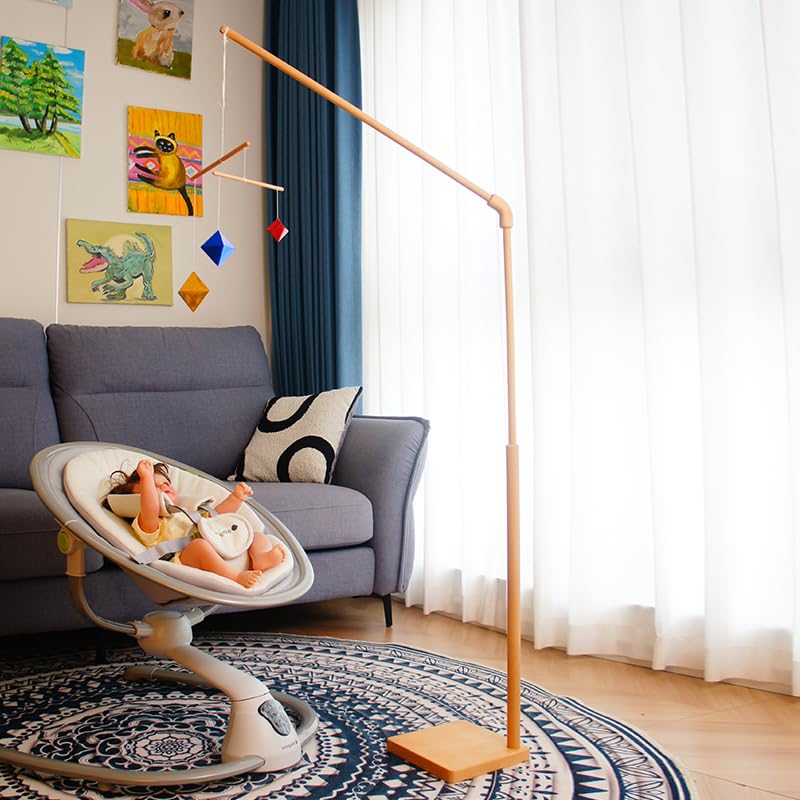 Nursery setup featuring the Purgano Montessori Mobile creates a serene play space.