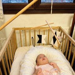 Purgano Montessori Octahedron dancer spins gently over crib