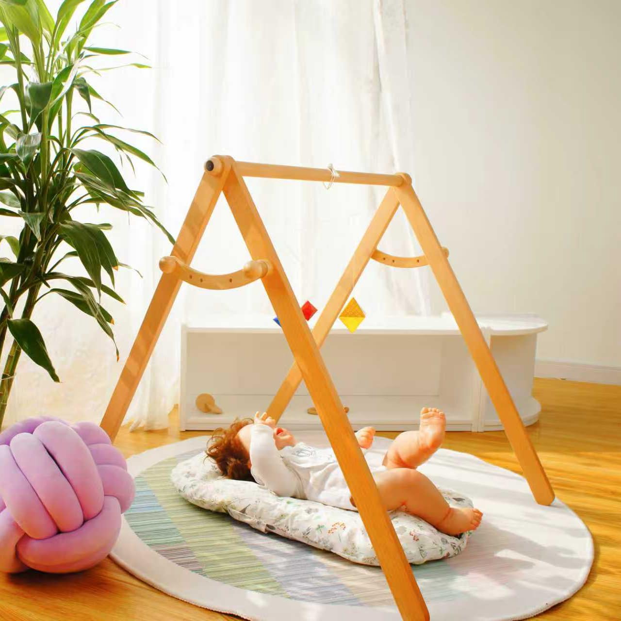 Purgano nursery setup shows the mobile in a harmonious crib area.
