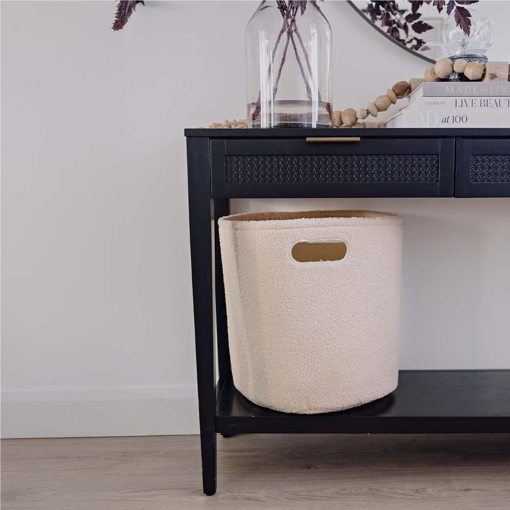 PUTSKA decorative storage basket adds style while hiding clutter.