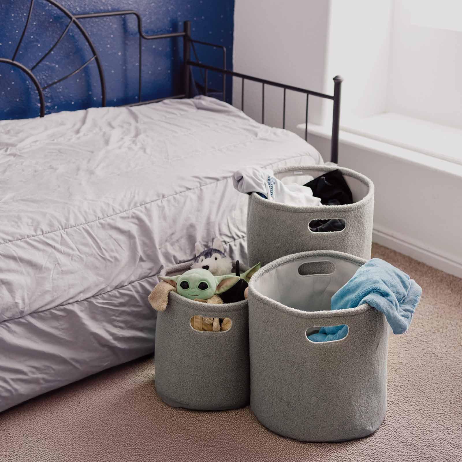 PUTSKA basket round grey with toys highlights quick cleanups and tidy play spaces.