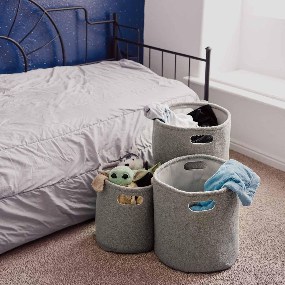 PUTSKA basket round grey with toys highlights quick cleanups and tidy play spaces.