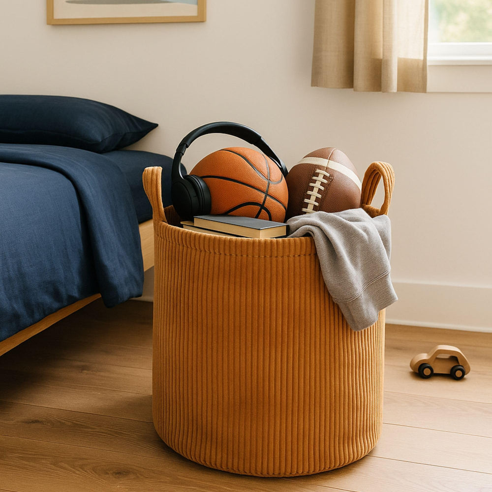 PUTSKA blanket basket neatly stored beside seating for quick access