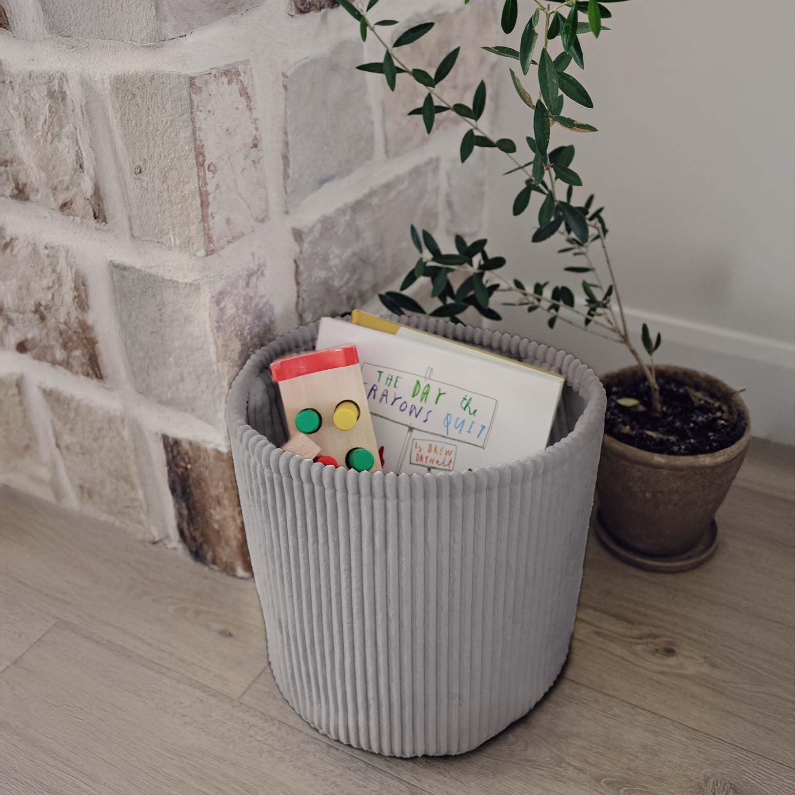 PUTSKA Blanket Basket grey nursery decor complements calm spaces.