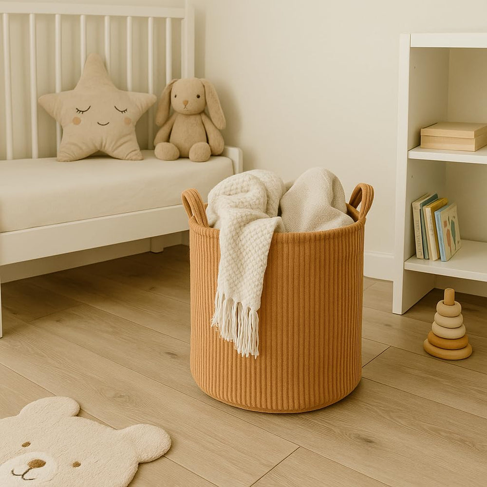 Putska round blanket basket 13x13 stores blankets neatly in the nursery.