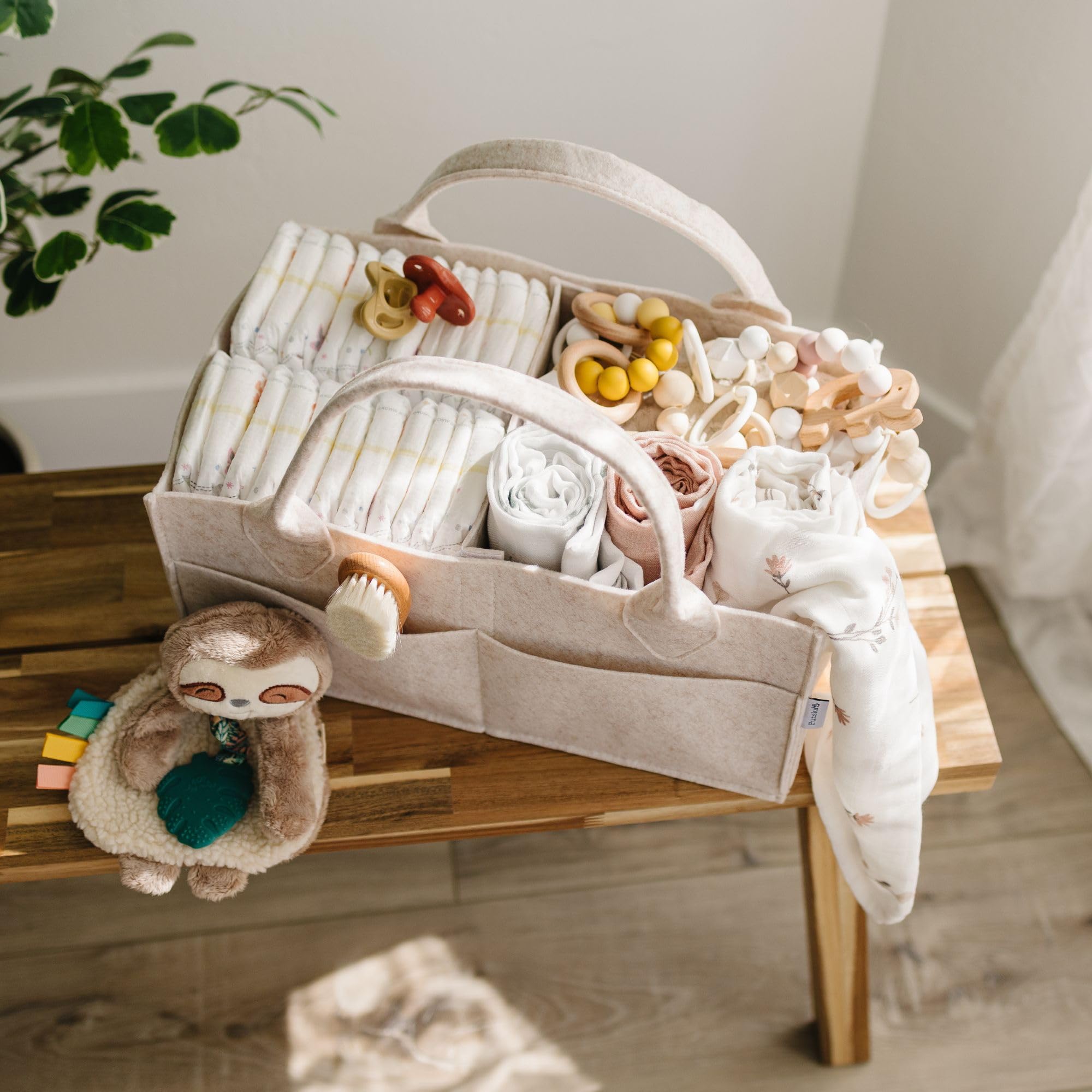 PUTSKA diaper caddy with removable dividers for a flexible interior layout.