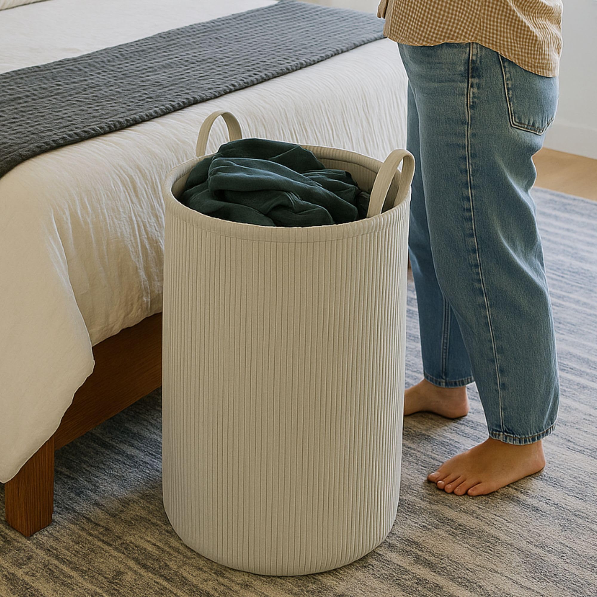 PUTSKA laundry basket as bedroom décor with practical storage.