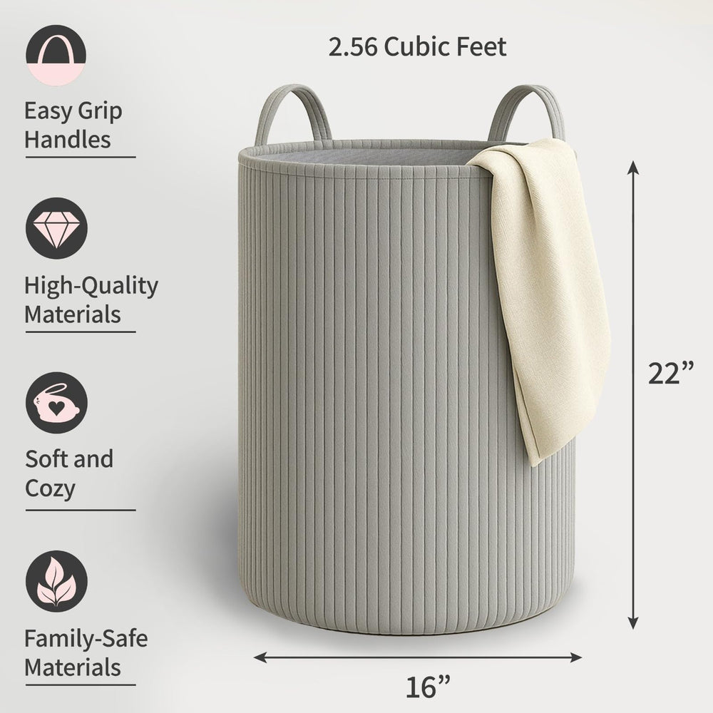 PUTSKA laundry basket filled with blankets for organized storage.