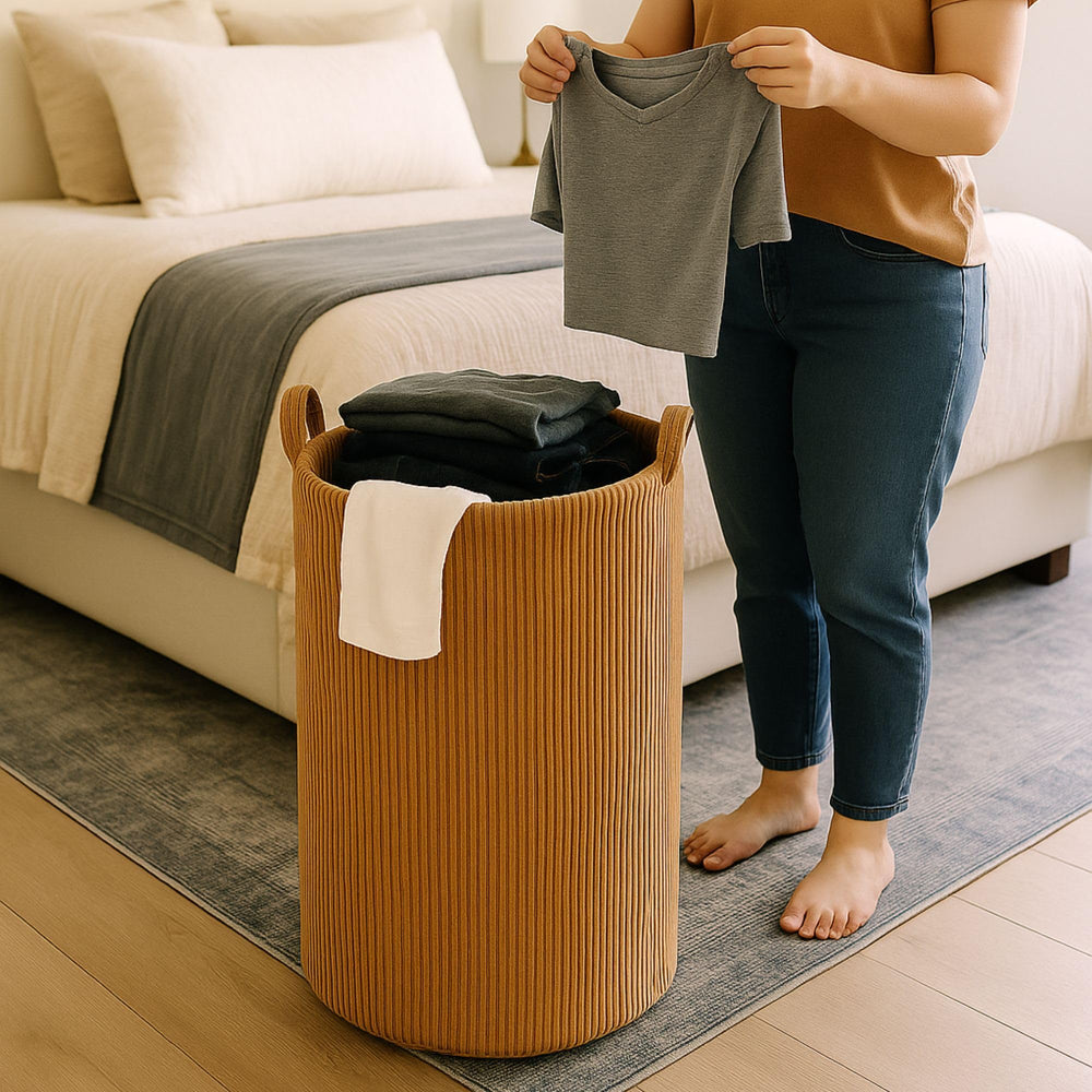 PUTSKA laundry basket in nursery decor, practical and stylish.