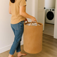 PUTSKA laundry basket side handle detail highlighting durable carry.