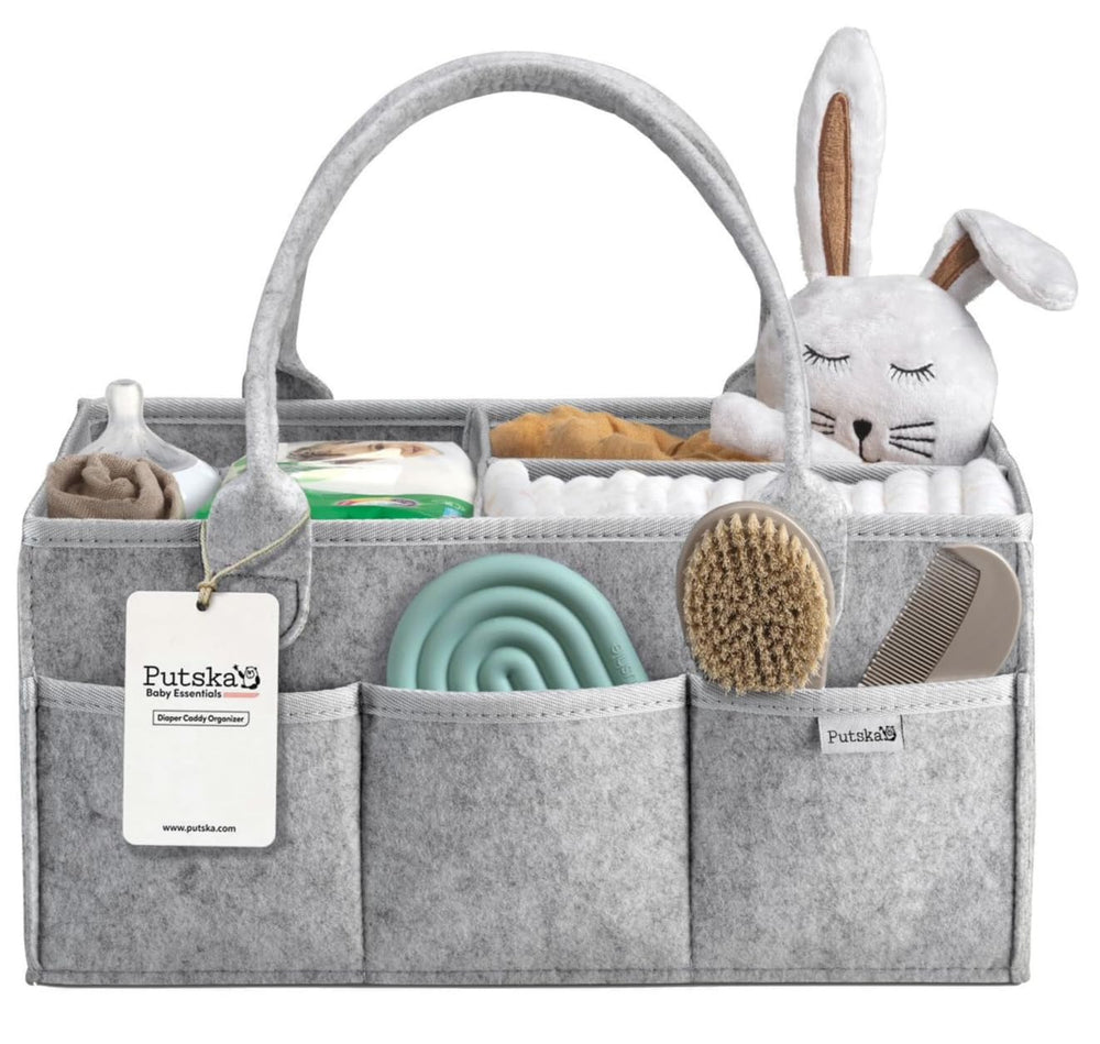 PUTSKA nursery organizer fits neatly on a changing table in 15x9x7 inches.