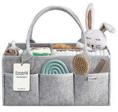 PUTSKA nursery organizer fits neatly on a changing table in 15x9x7 inches.