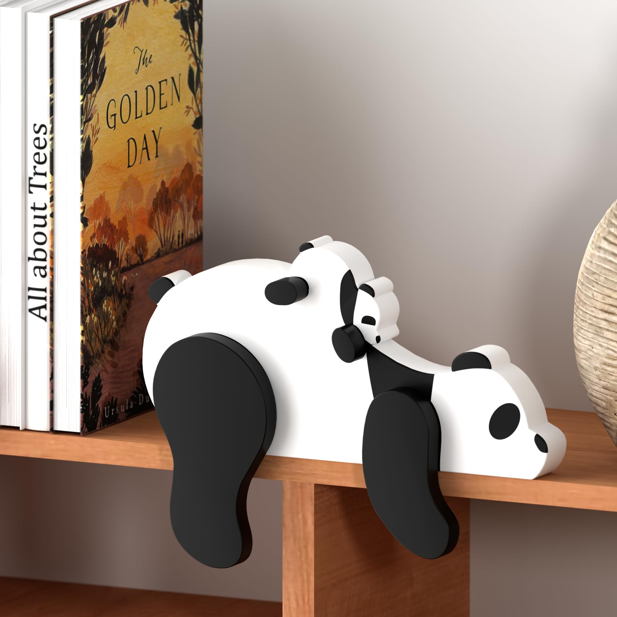 PUTSKA panda bookshelf decor complements woodland-themed nursery displays.