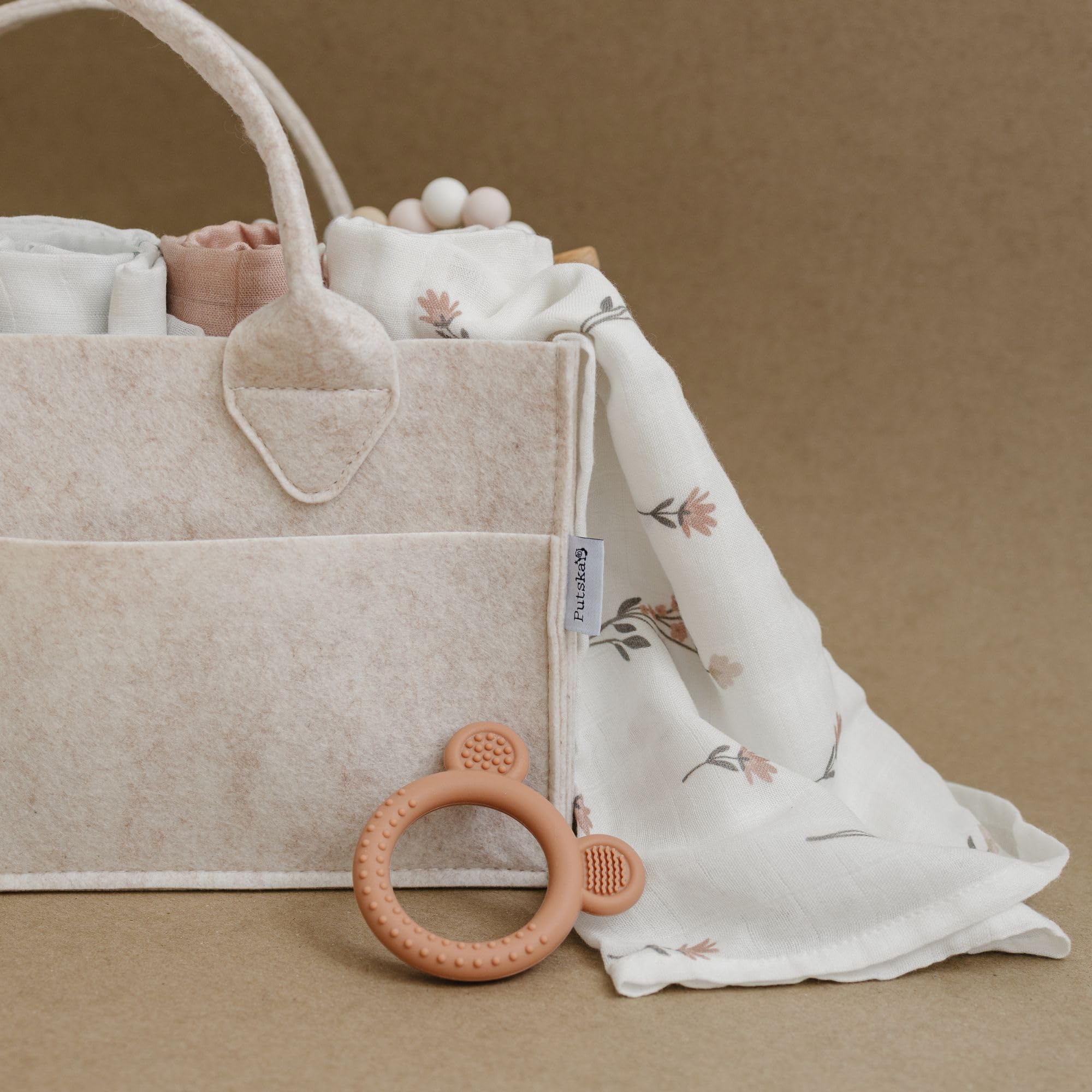PUTSKA portable diaper organizer supports quick changes on trips.
