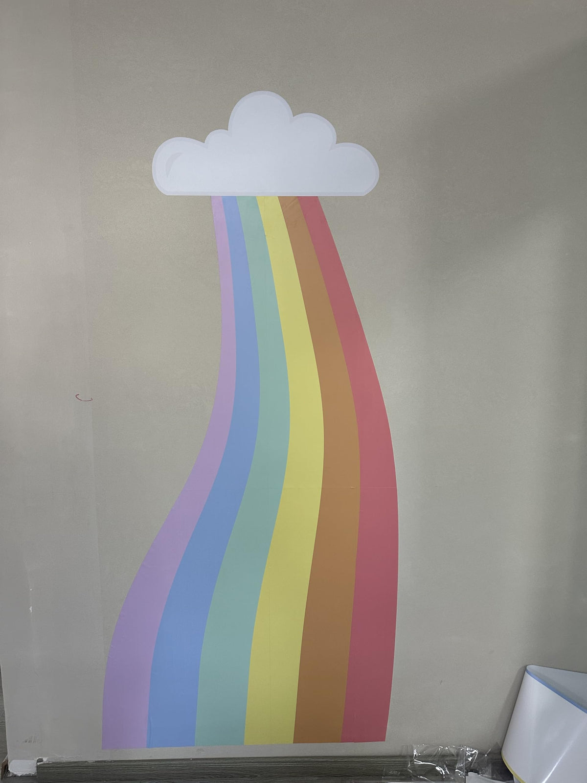 PUTSKA Rainbow Sticker Background for Corner Storage keeps plush toys organized and decor-friendly.