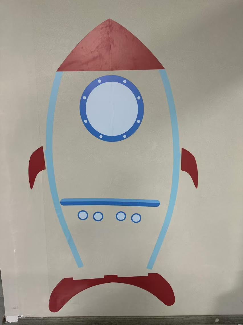 PUTSKA Spaceship Background sticker adds playful space vibes to corner storage, inspiring imaginative play.
