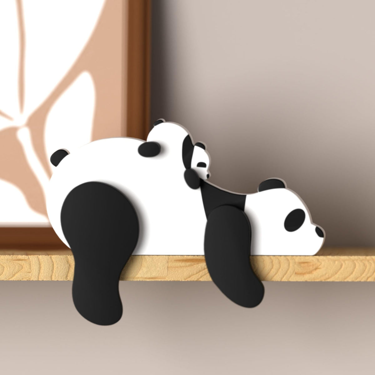 PUTSKA wooden panda nursery decor on shelf adds warm woodland charm.