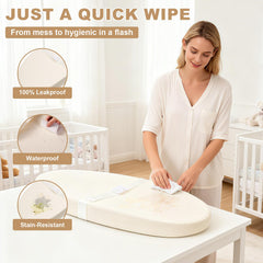 Qalvyn contoured changing pad with foam cushion supporting baby's spine