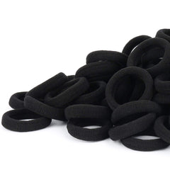Qarwayoc black seamless hair tie close-up, gentle cotton blend for snag-free ponytails.