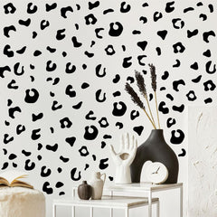 Qaxrocyn matte black leopard decal set on a wall for bold texture and style