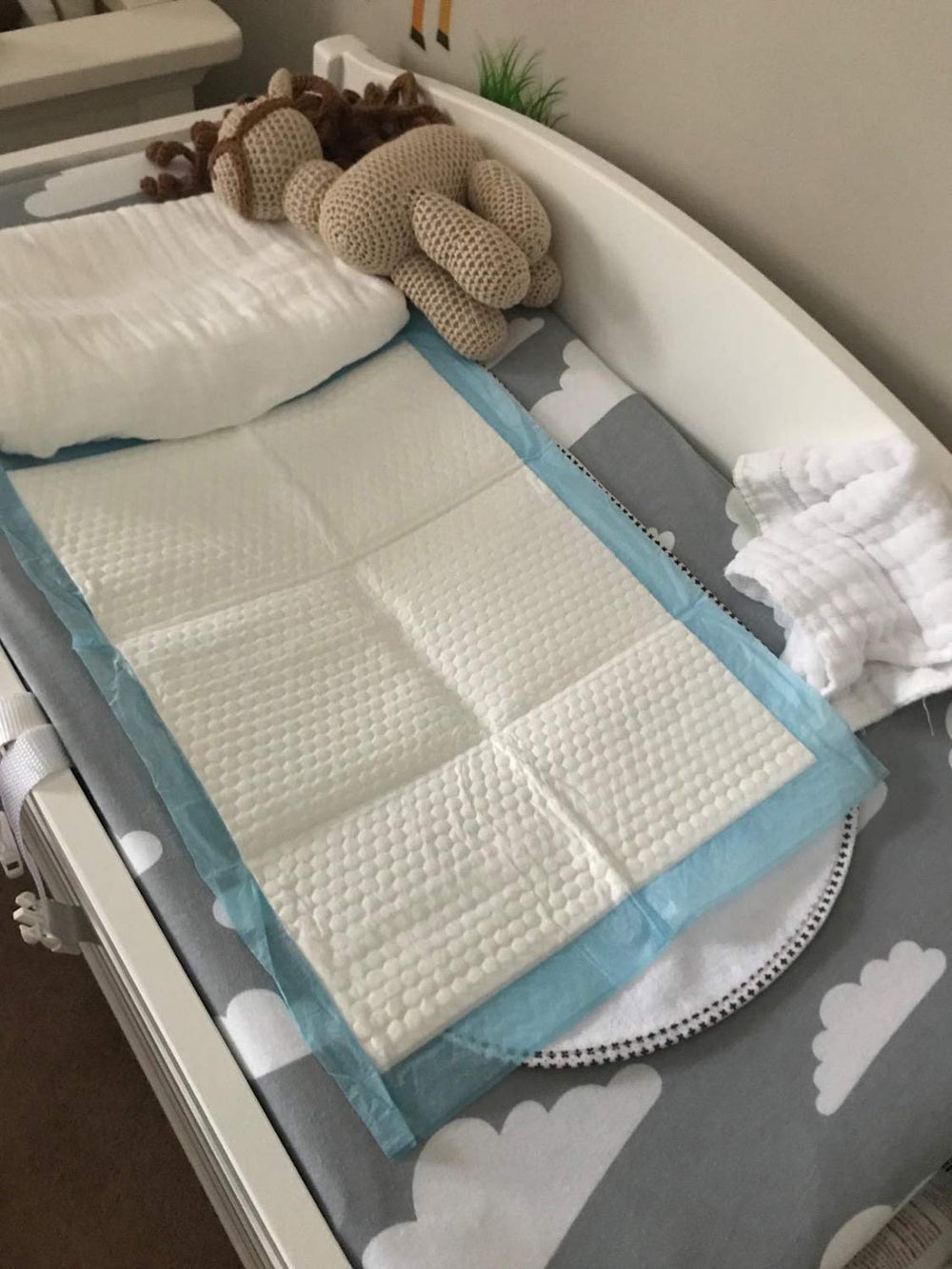 QDTTSRY pre-folded changing pad for travel, ready to slip into a bag