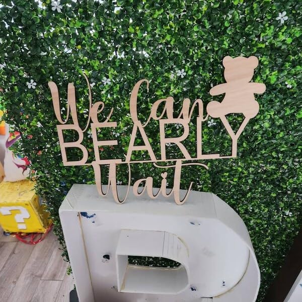 QENWWENG nursery wall decor in natural wood tones enhances the space