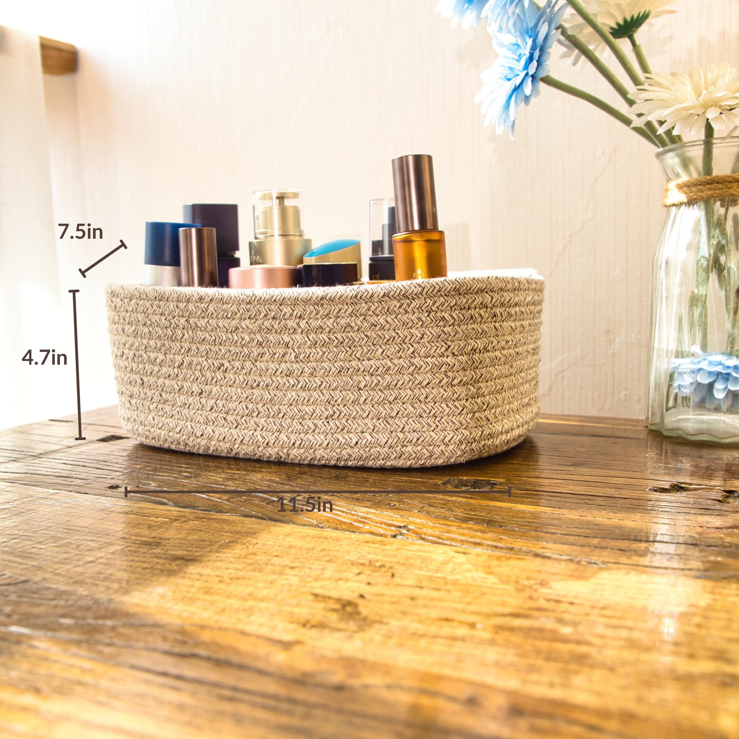 QFLQFL Small Woven Storage Basket for bathroom essentials and towels.