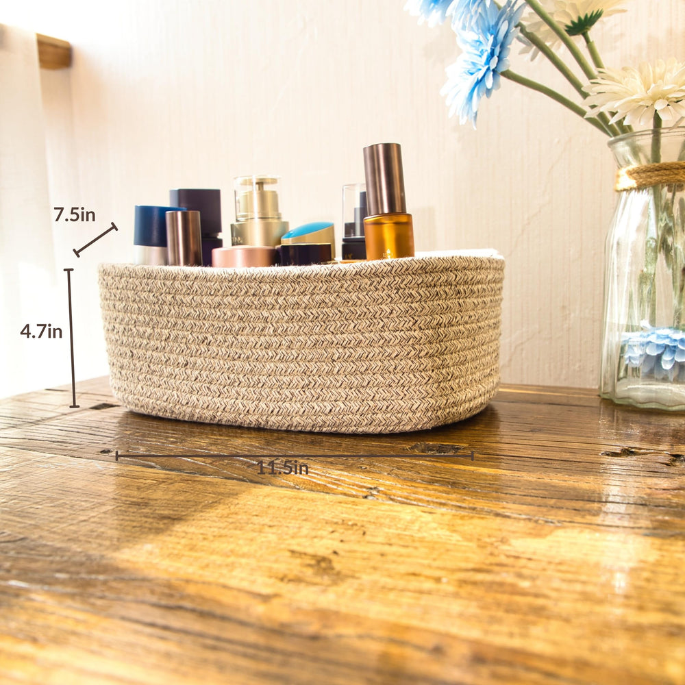 QFLQFL Small Woven Storage Basket for bathroom essentials and towels.