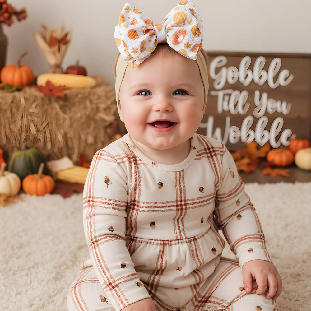 QFV Thansgiving baby photoshoot accessory enhances portraits.