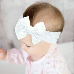 Qiansail lace bow knot headband pink, gentle fabric ideal for daily wear.
