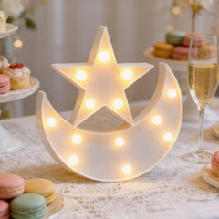 QiaoFei moon-star night light display on wall for decor versatility.