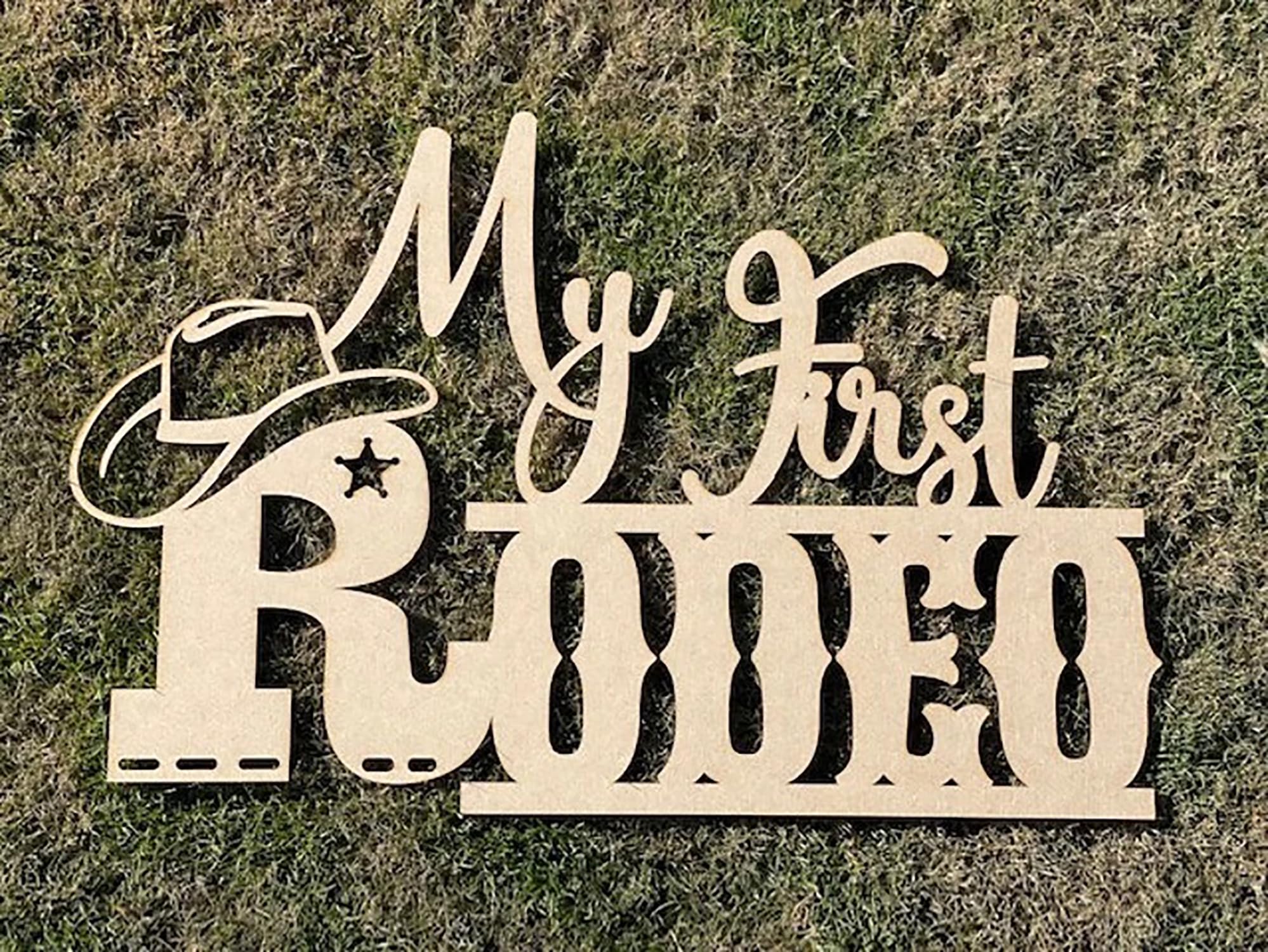 QPARTYFIRE My First Rodeo Sign side view, versatile decor for events.