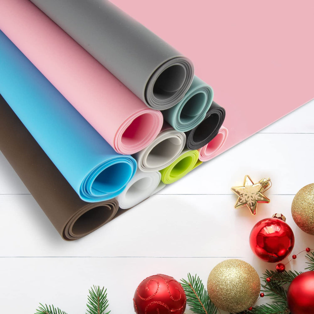 QPIX DIGITAL craft mat used for art projects on a sturdy surface.