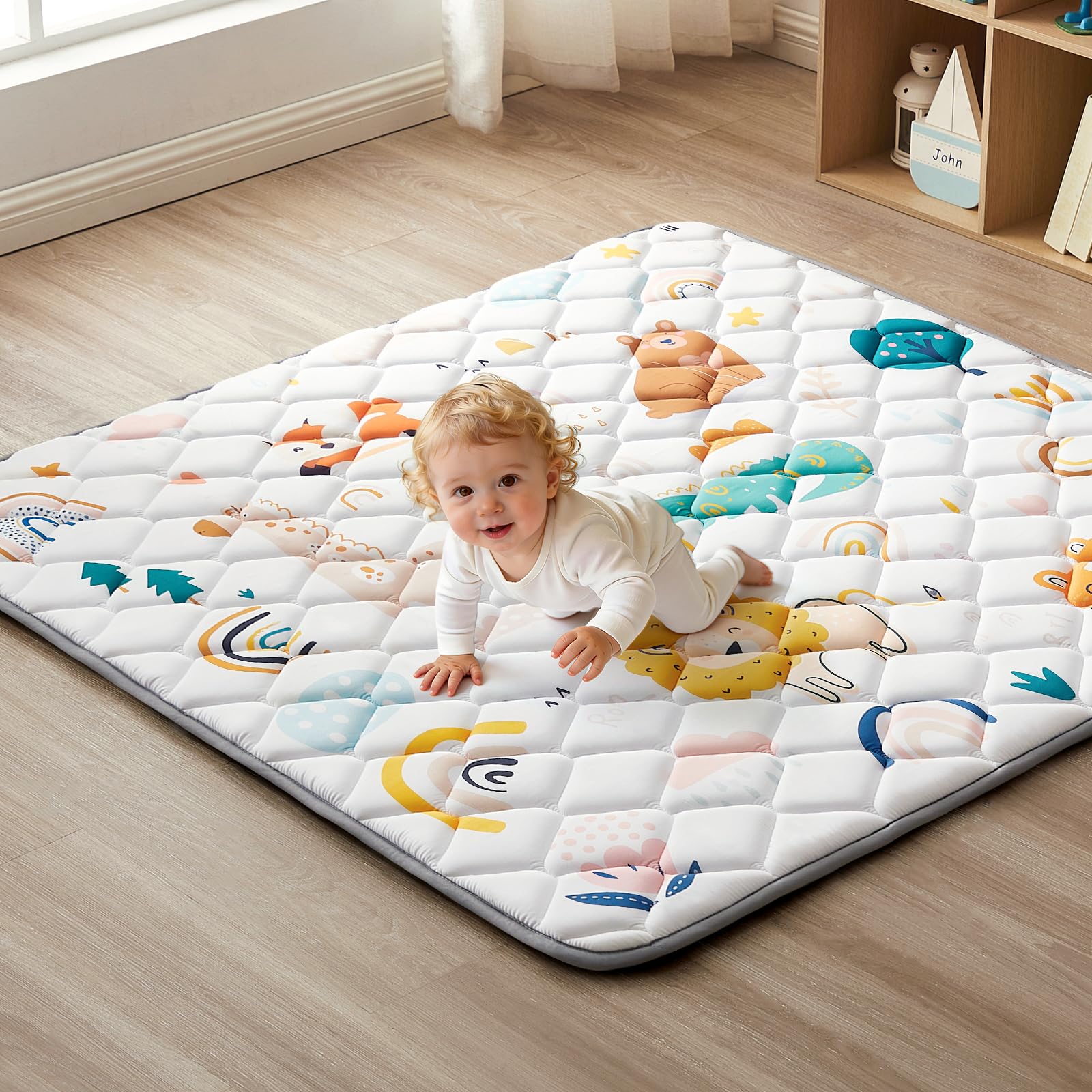 QUAFRET Baby Play Mat 43x43 inch provides soft comfort for tummy time and play.