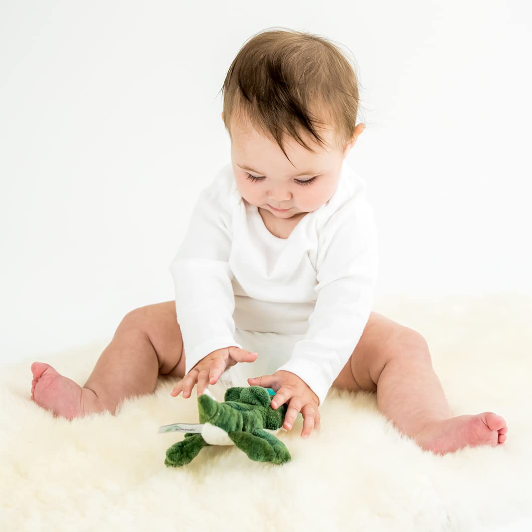 Queebi PaciBuddy plush supports comforting cuddles during naps and bedtime.