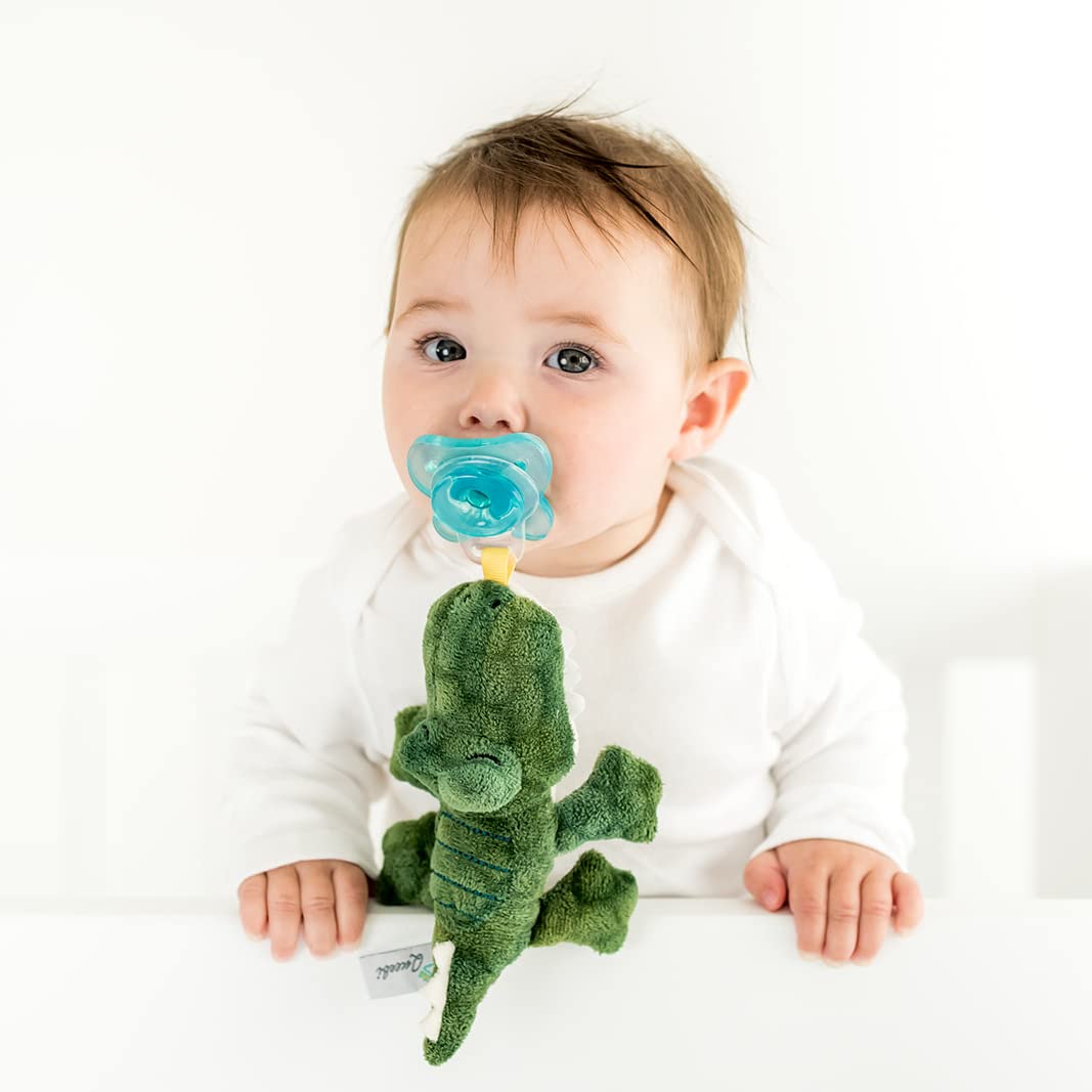 Queebi PaciBuddy crocodile plush keeps pacifier within reach for soothing snuggles.