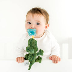 Queebi PaciBuddy crocodile plush keeps pacifier within reach for soothing snuggles.