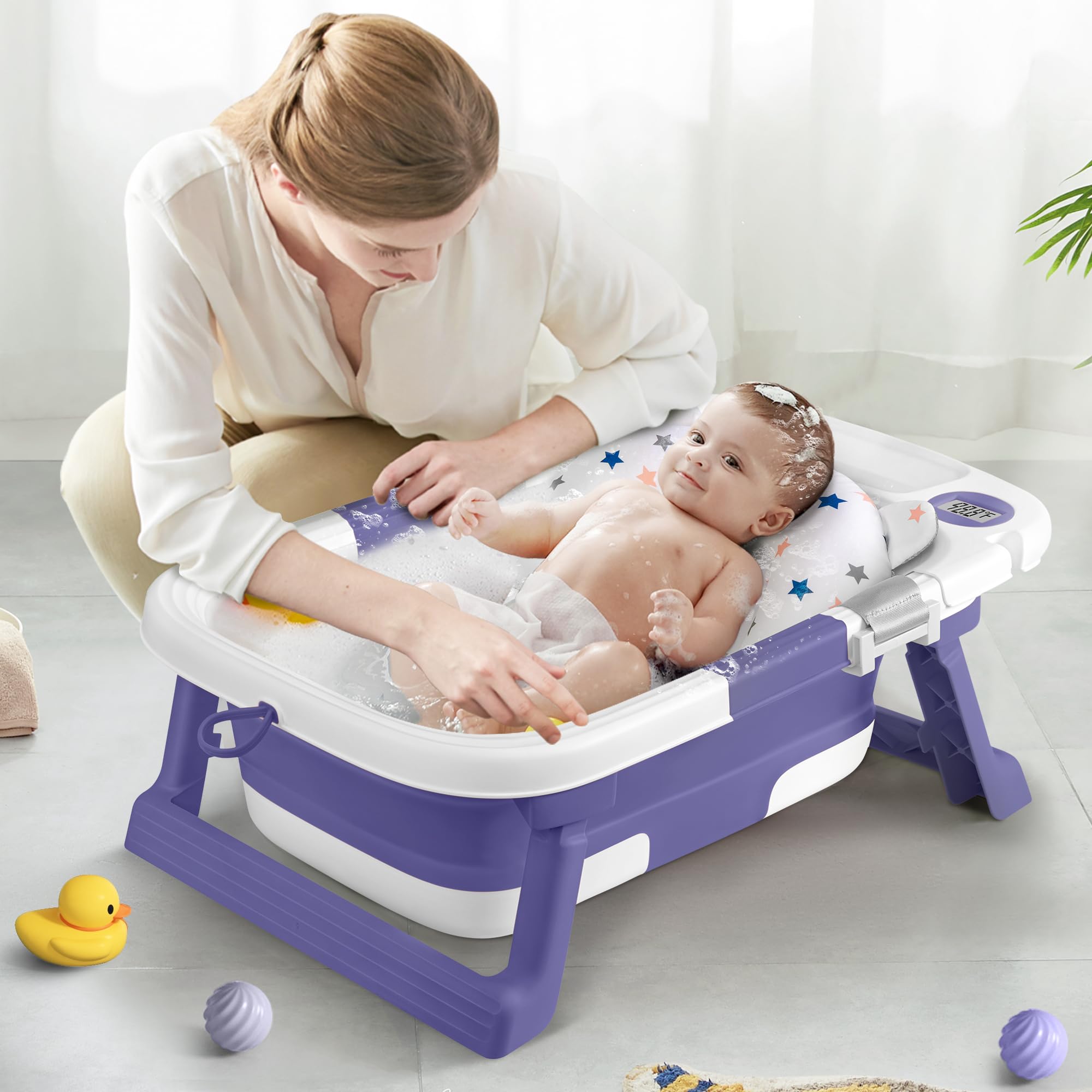 QueenFul travel-ready tub suitable for newborns to toddlers with supervision.