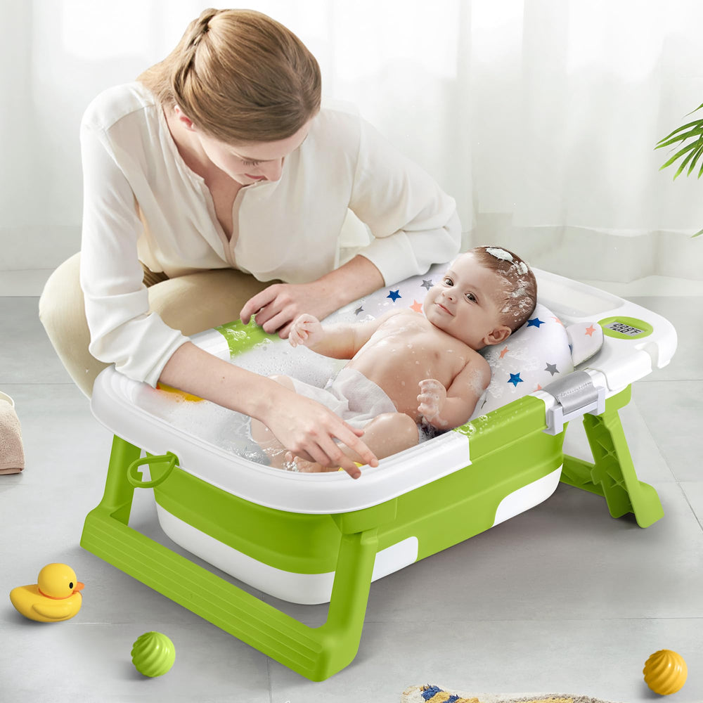 QueenFul portable travel-friendly green bath tub for on-the-go baths.