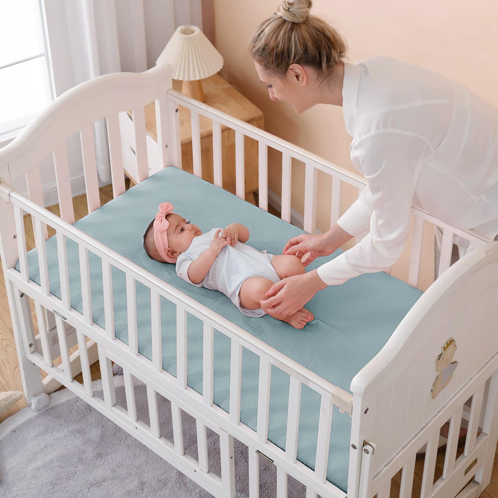 QUENESS neutral bedding complements any nursery theme and color scheme