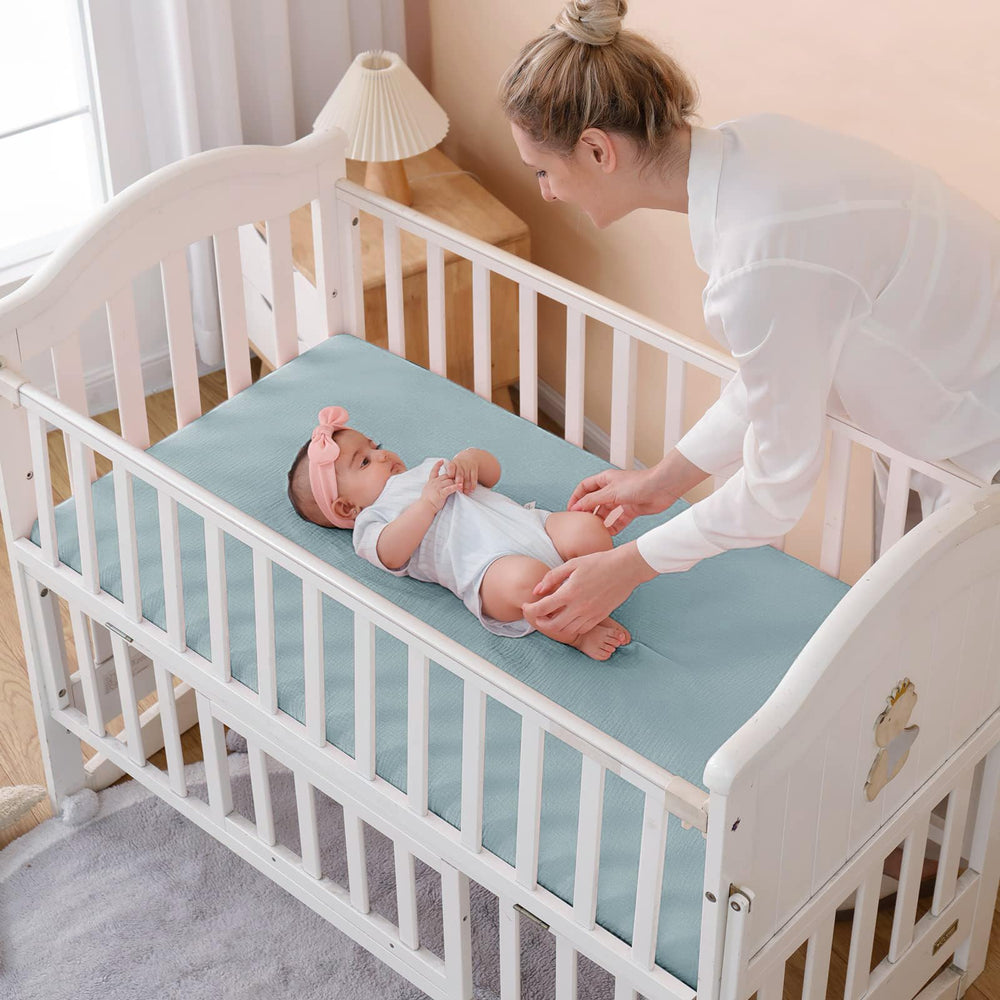 QUENESS neutral bedding complements any nursery theme and color scheme