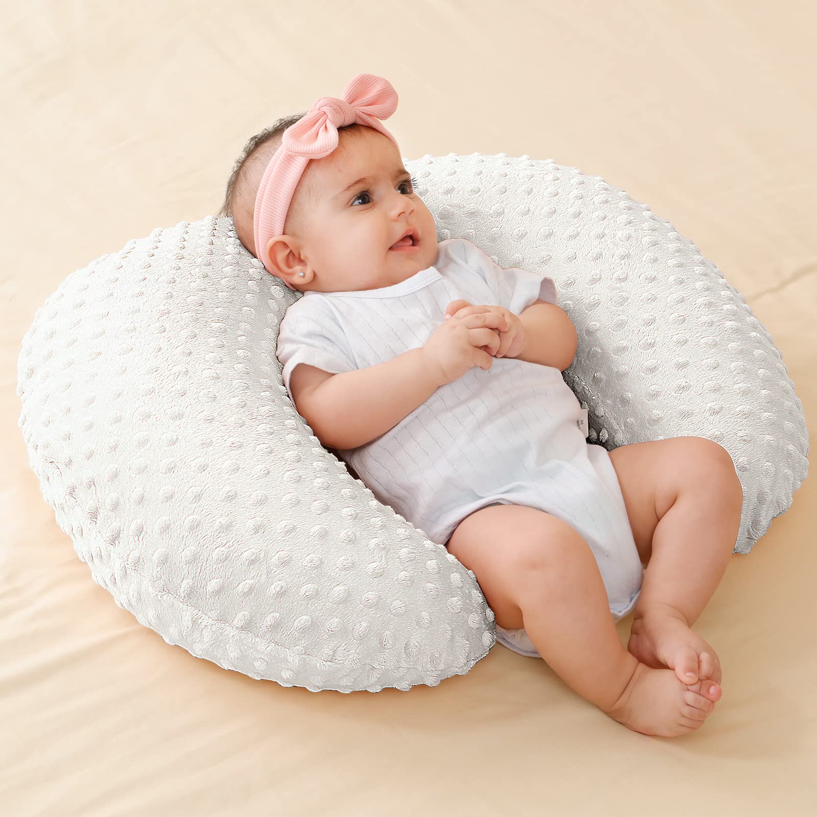 QUENESS nursing pillow compressed packaging demonstrates quick expansion