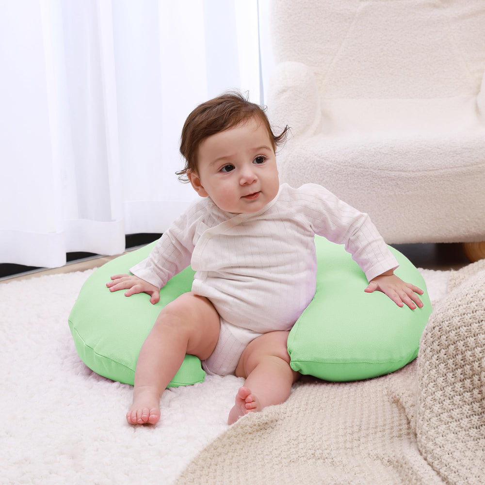 QUENESS nursing pillow green side view helps cradle baby with ease