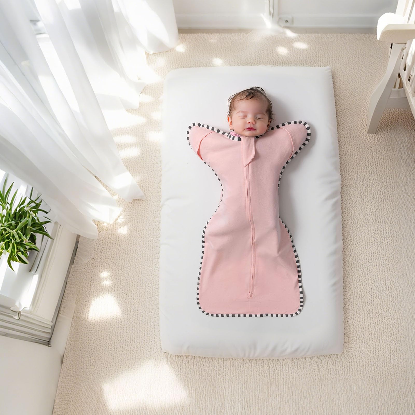 QUENESS Transition Swaddle makes a thoughtful baby shower gift.
